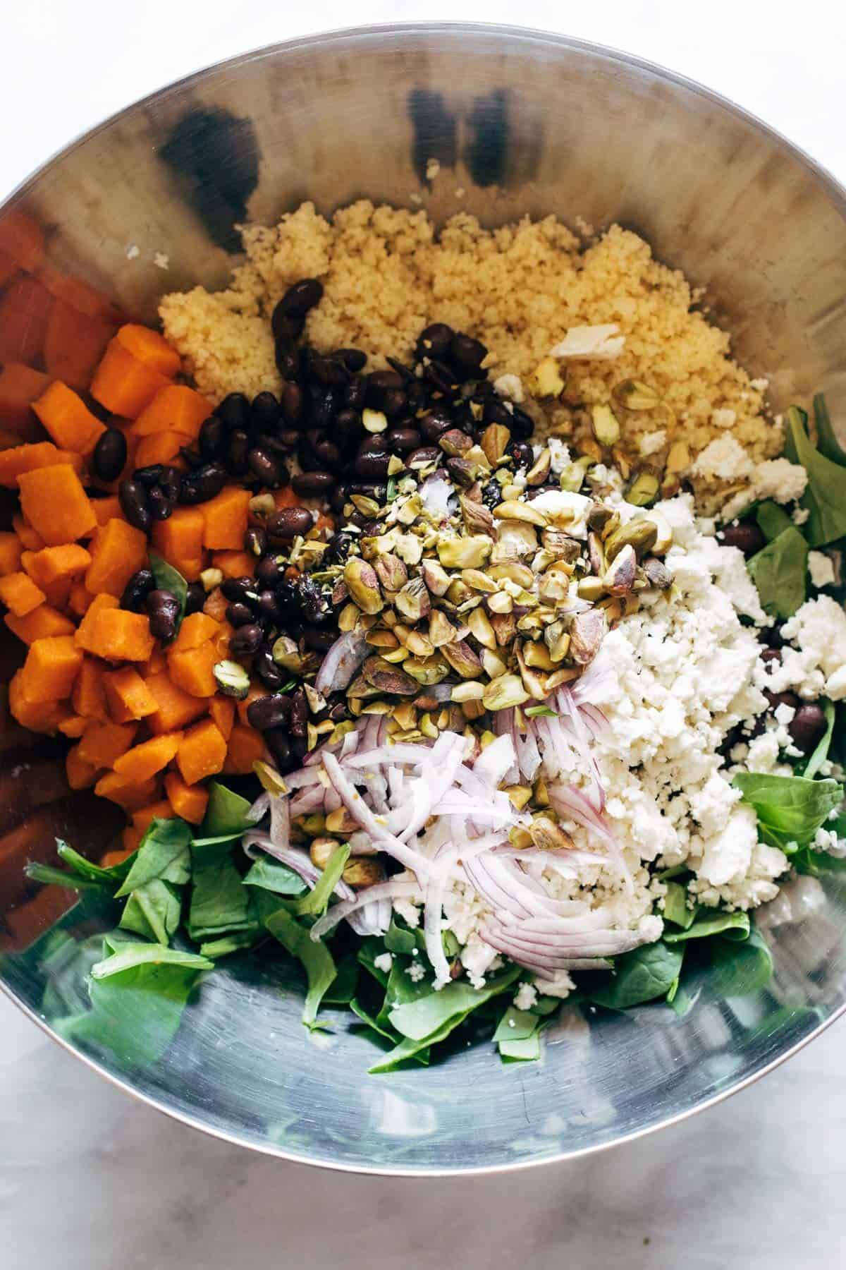 库斯库斯salad in a bowl before mixing.